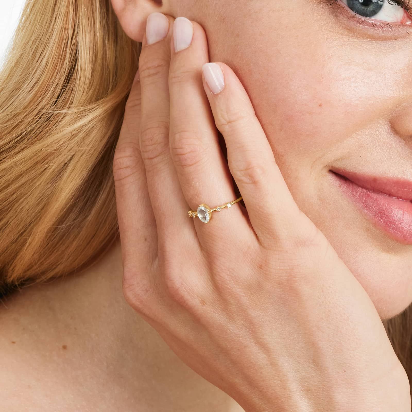 Oval Aquamarine And Diamond Birthstone Ring In 14K Yellow Gold