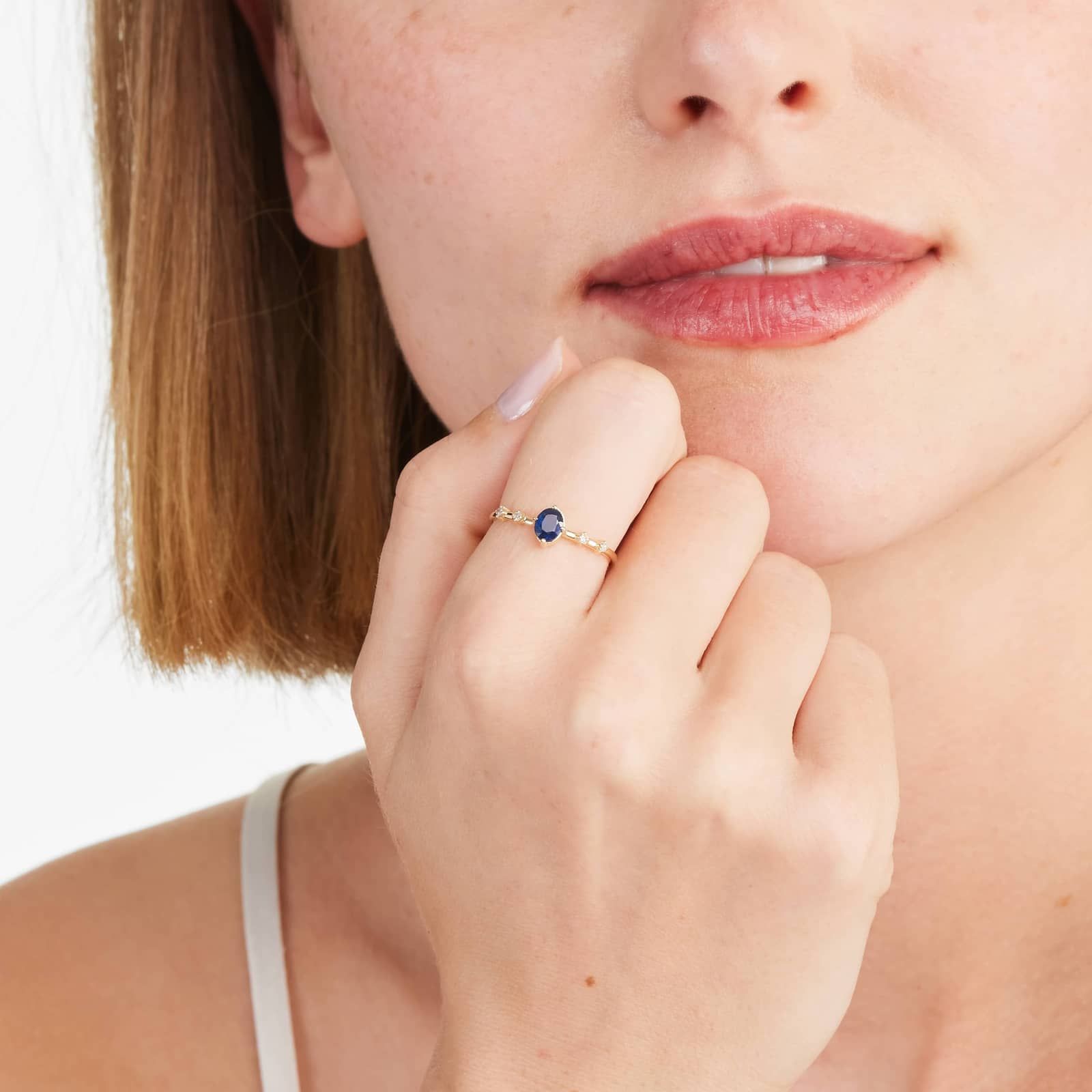 Oval Sapphire And Diamond Birthstone Ring In 14K Yellow Gold