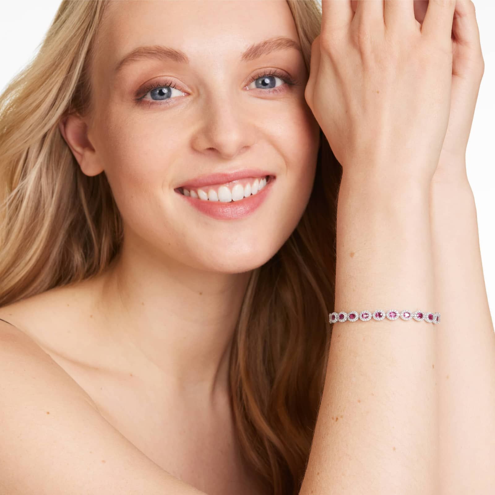 Oval Cut Ruby And Diamond Halo Bracelet In 14K White Gold