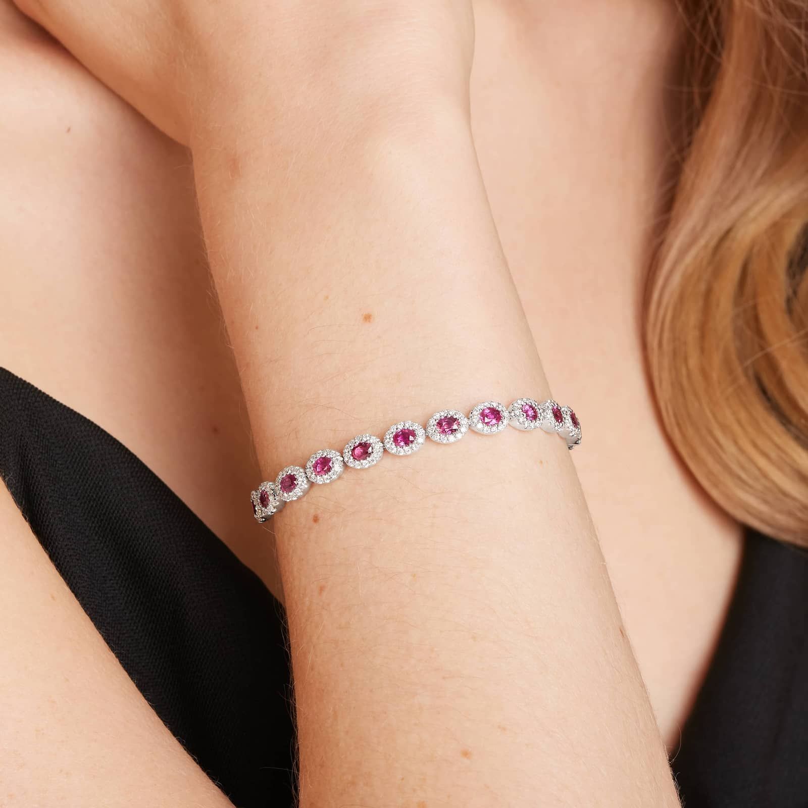 Oval Cut Ruby And Diamond Halo Bracelet In 14K White Gold