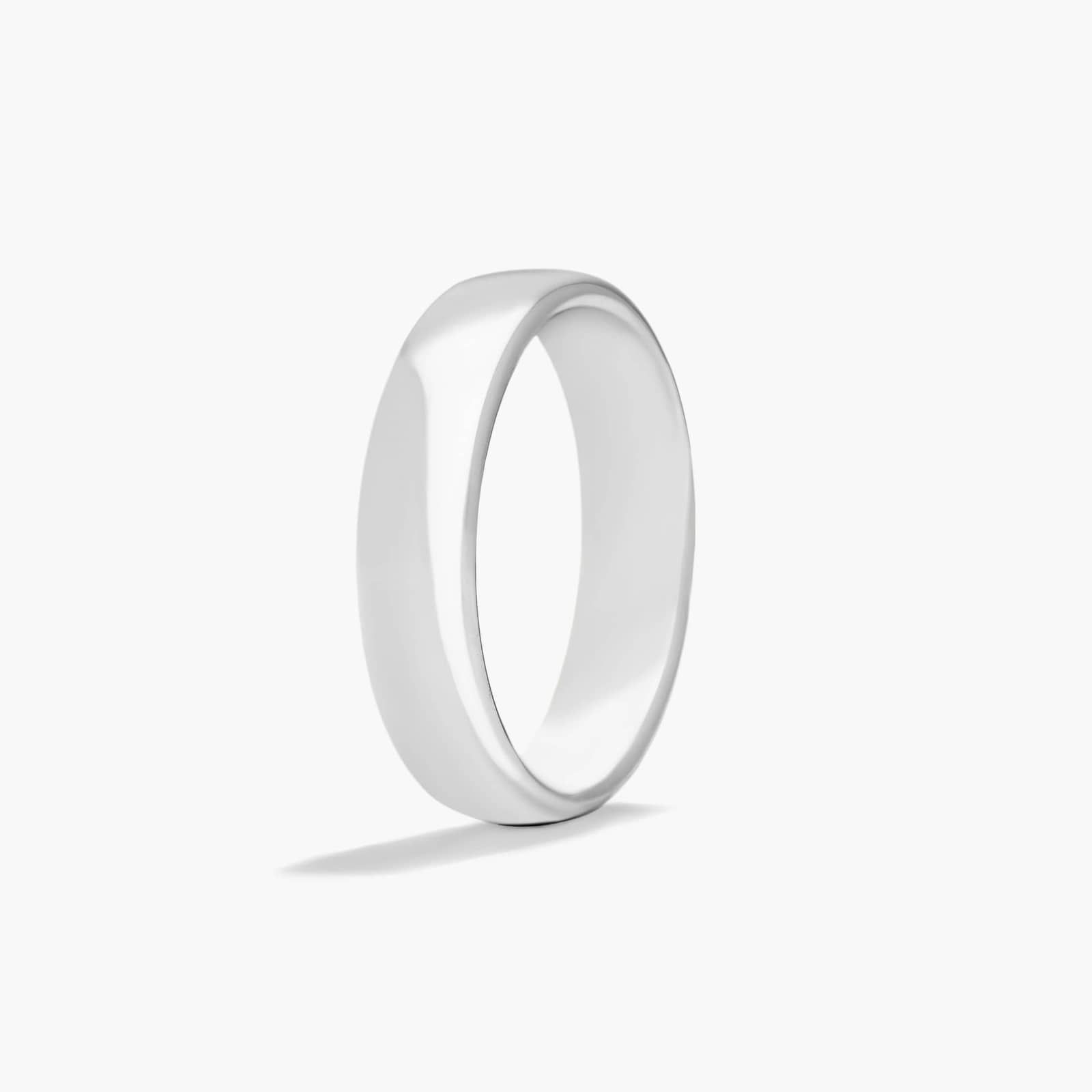 Comfort Fit Slightly Flat  Wedding Band In Platinum (5.50mm)