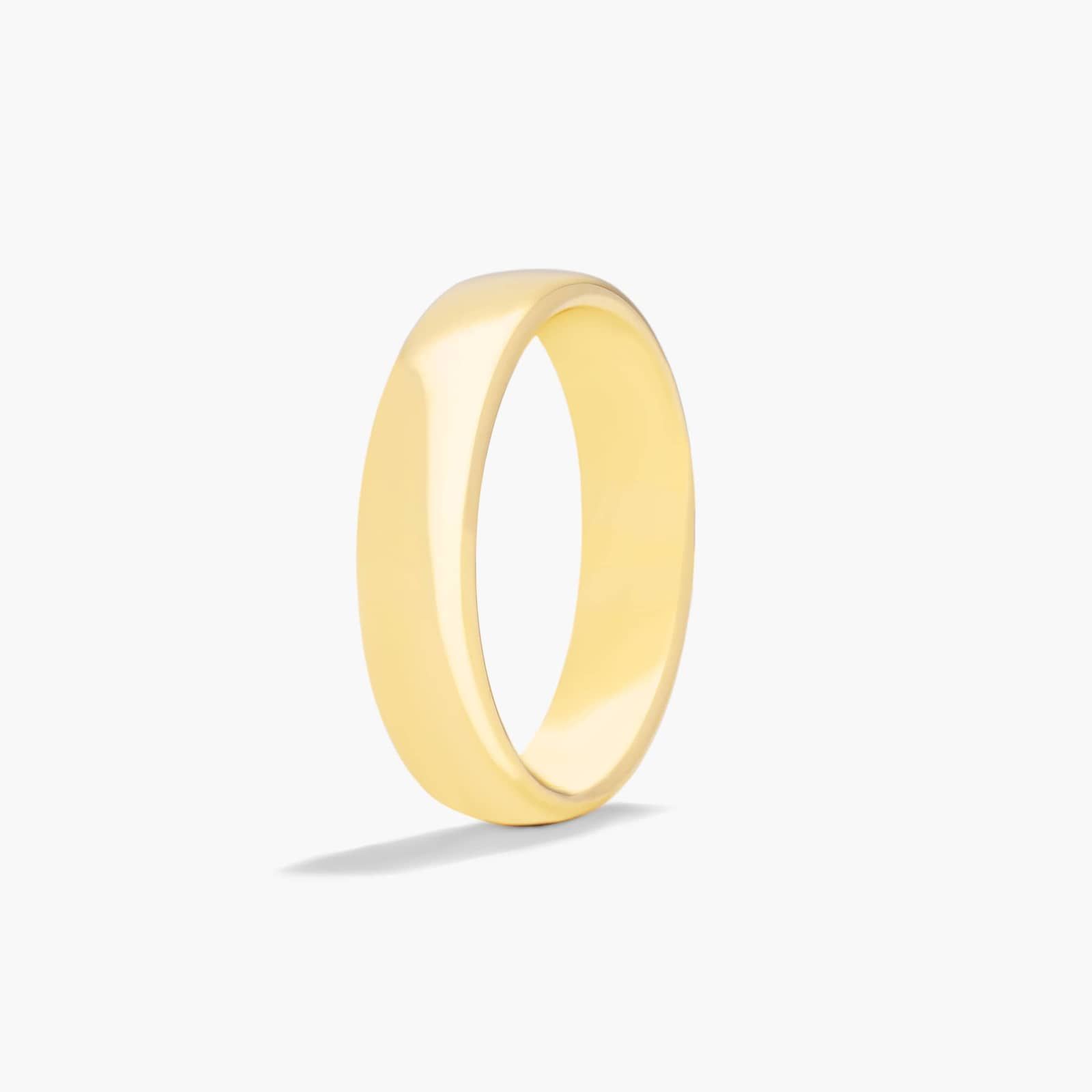 Comfort Fit Slightly Flat  Wedding Band In 18K Yellow Gold (5.50mm)