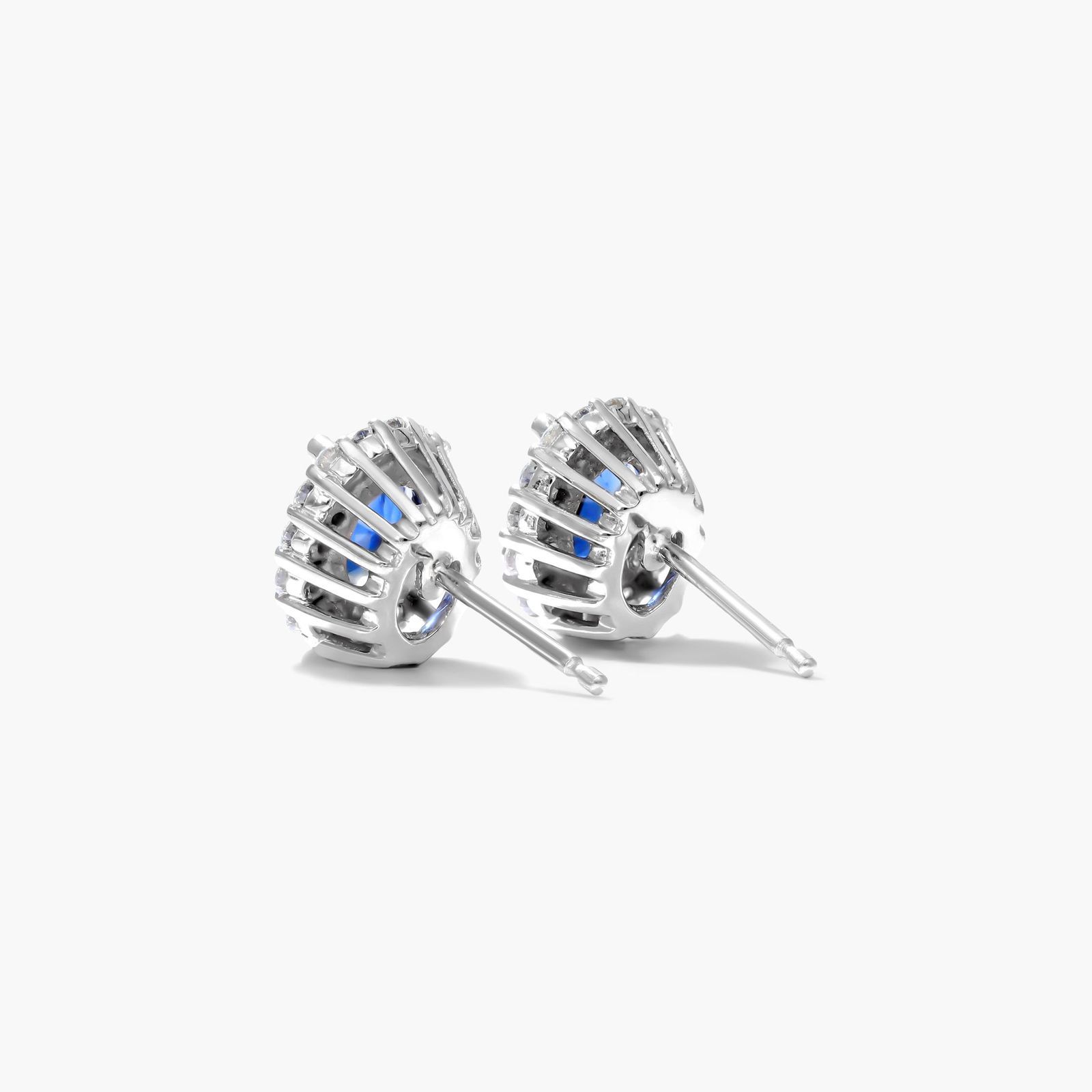 Blue Sapphire And Diamond Halo Earrings In 14K White Gold