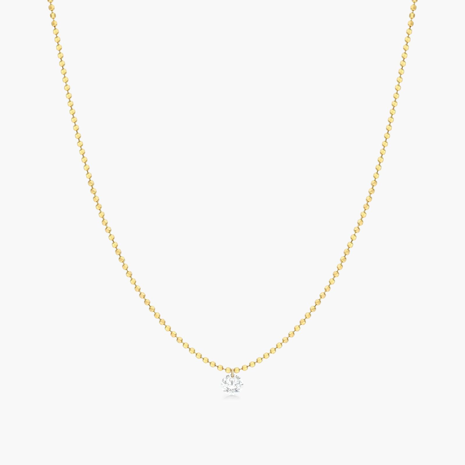Single Pierced Diamond Speck Necklace In 14K Yellow Gold by Brevani