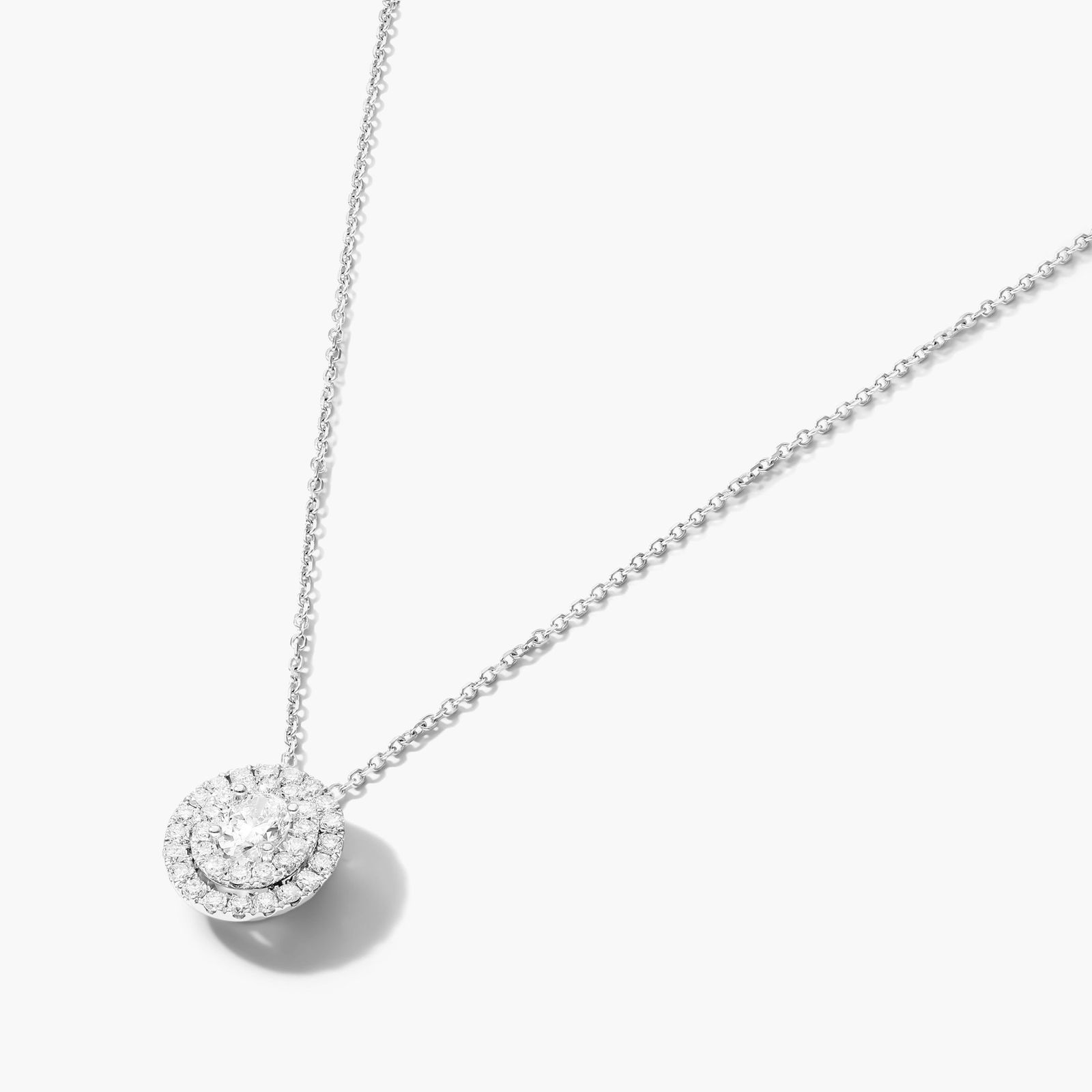Double Halo Oval Cut Diamond Necklace In 18K White Gold