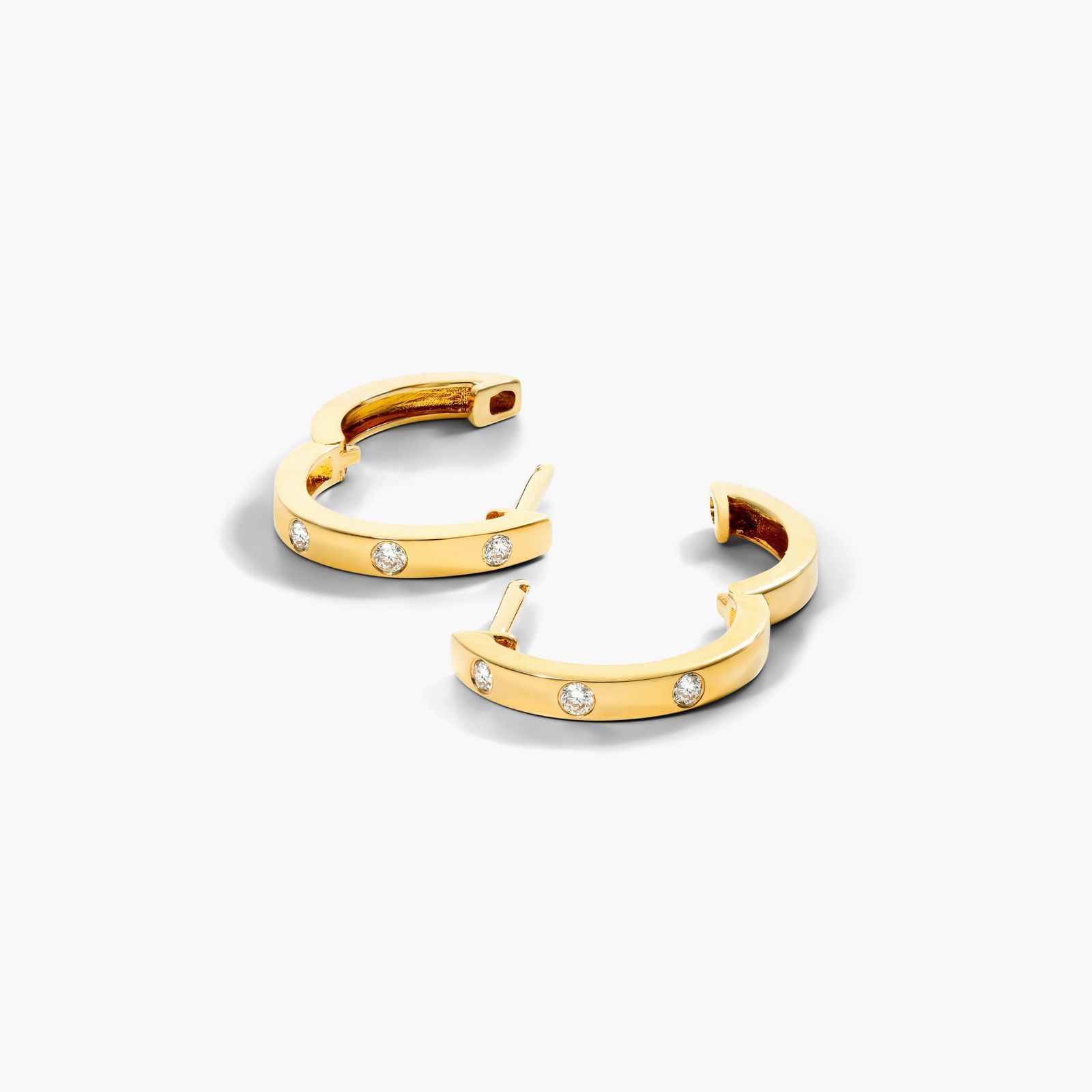Bezel Diamond Huggie Hoop Earrings In 14K Yellow Gold