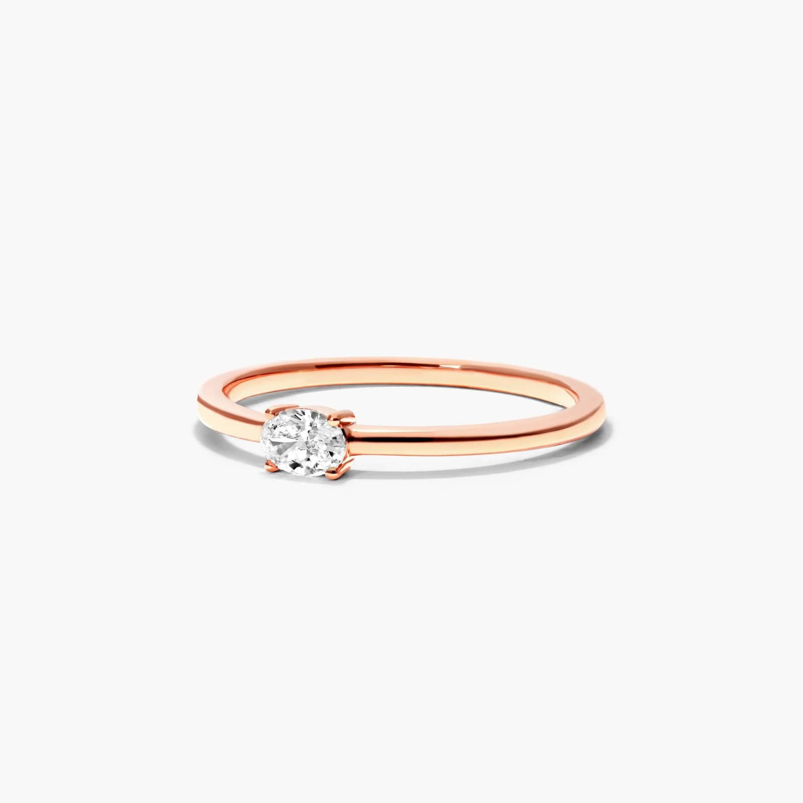 Petite Oval Cut Solitaire Diamond Ring In 14K Rose Gold