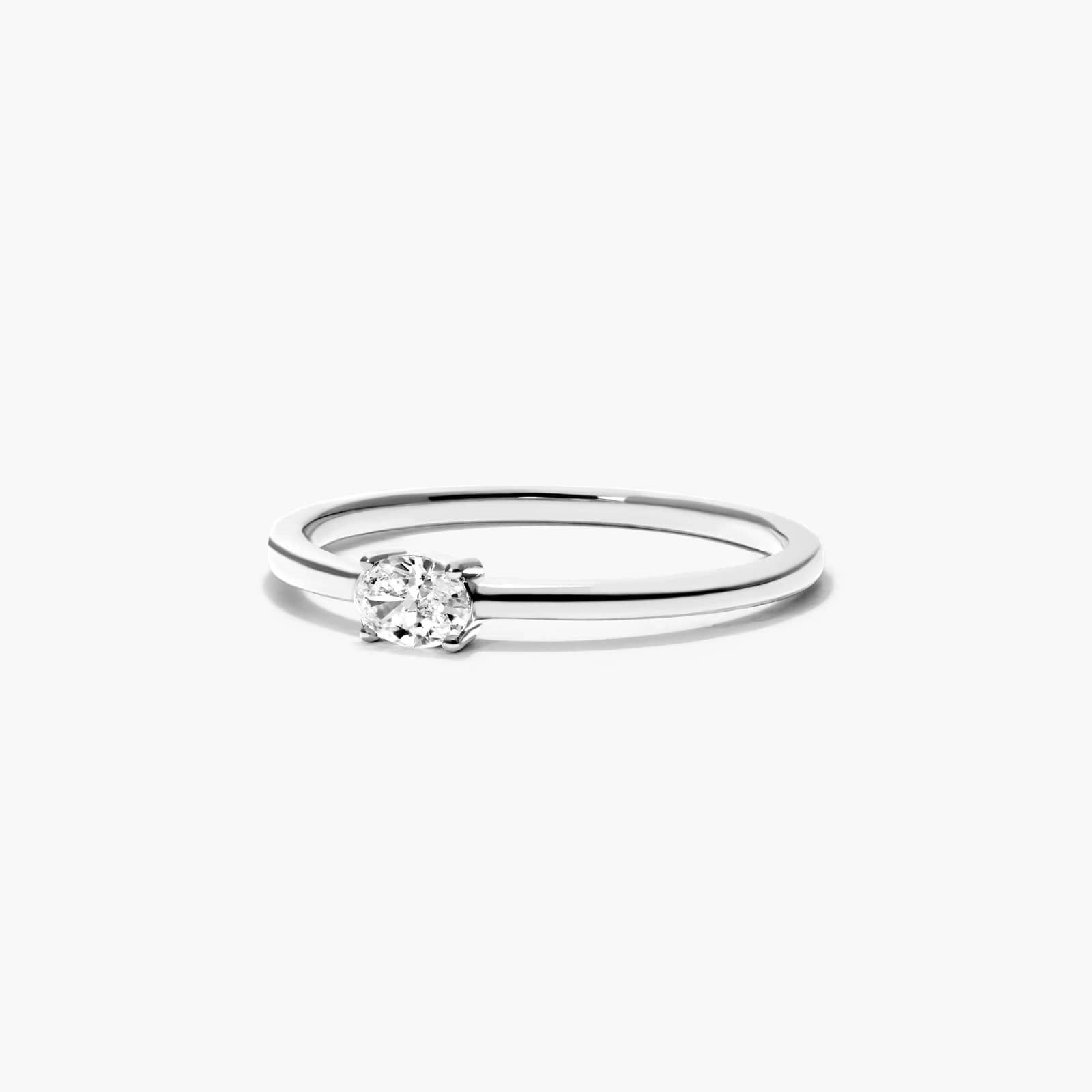 Petite Oval Cut Solitaire Diamond Ring In 14K White Gold