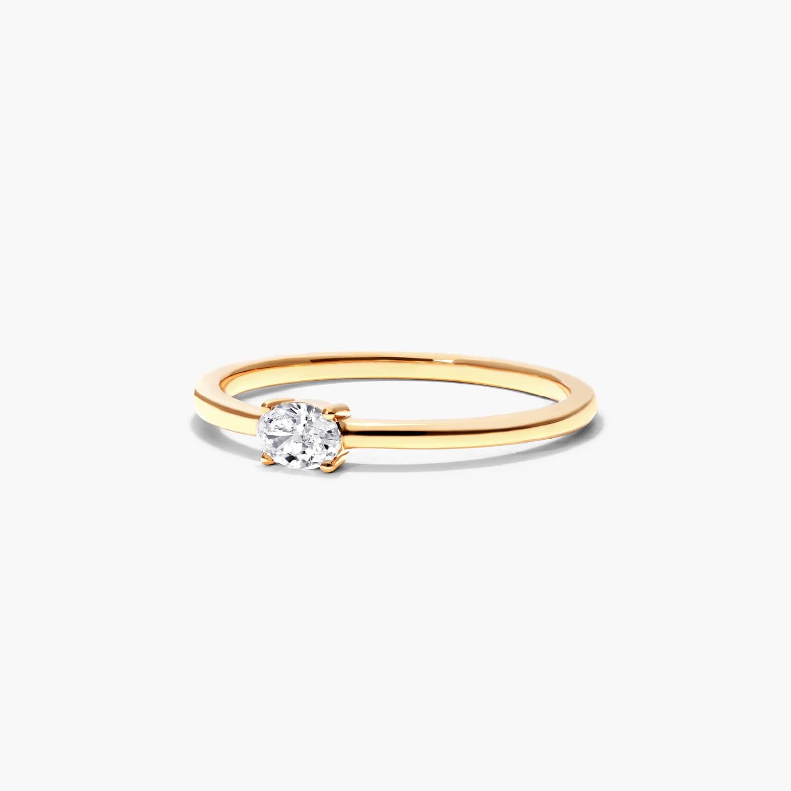 Petite Oval Cut Solitaire Diamond Ring In 14K Yellow Gold