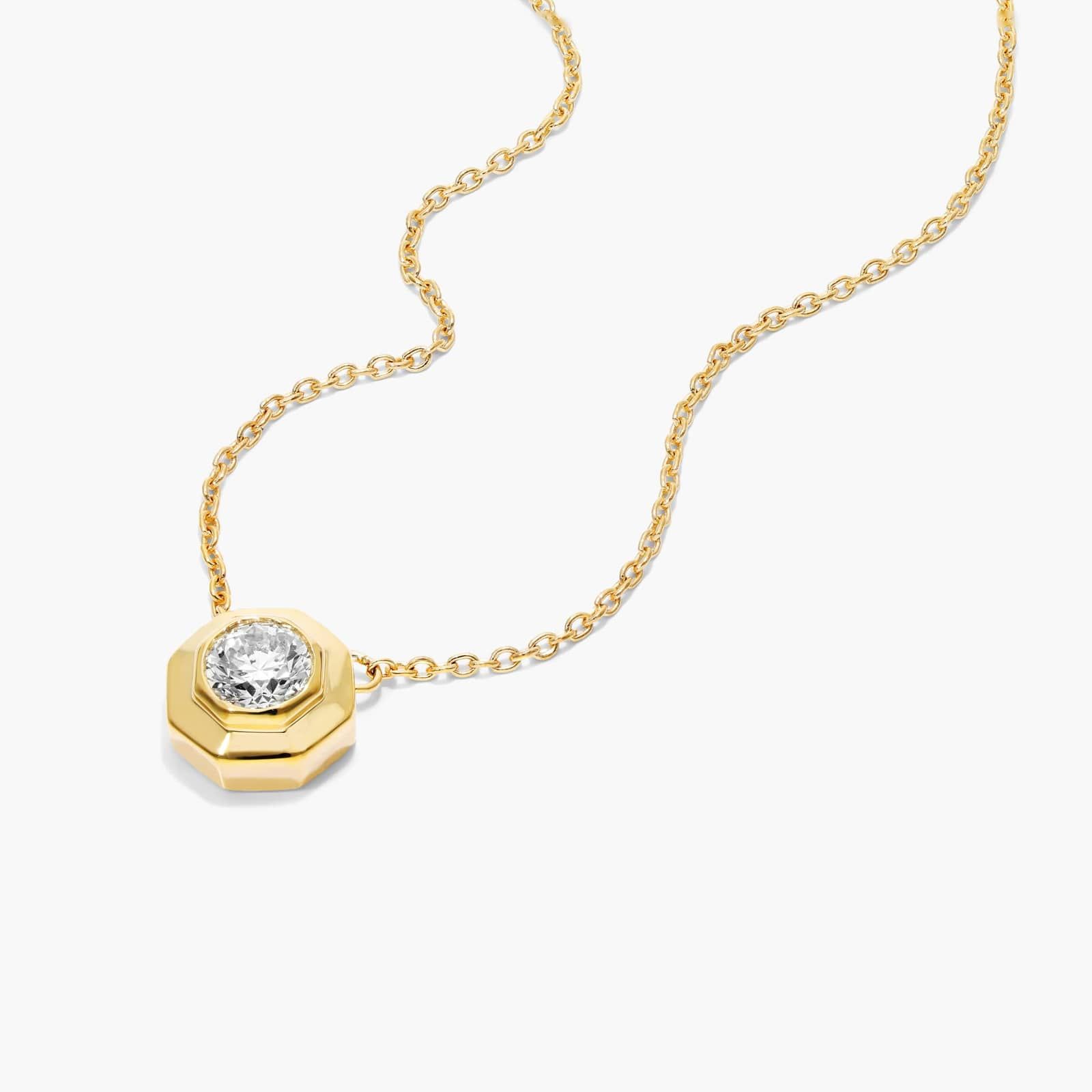 Octagonal Frame Diamond Solitaire Pendant In 14K Yellow Gold