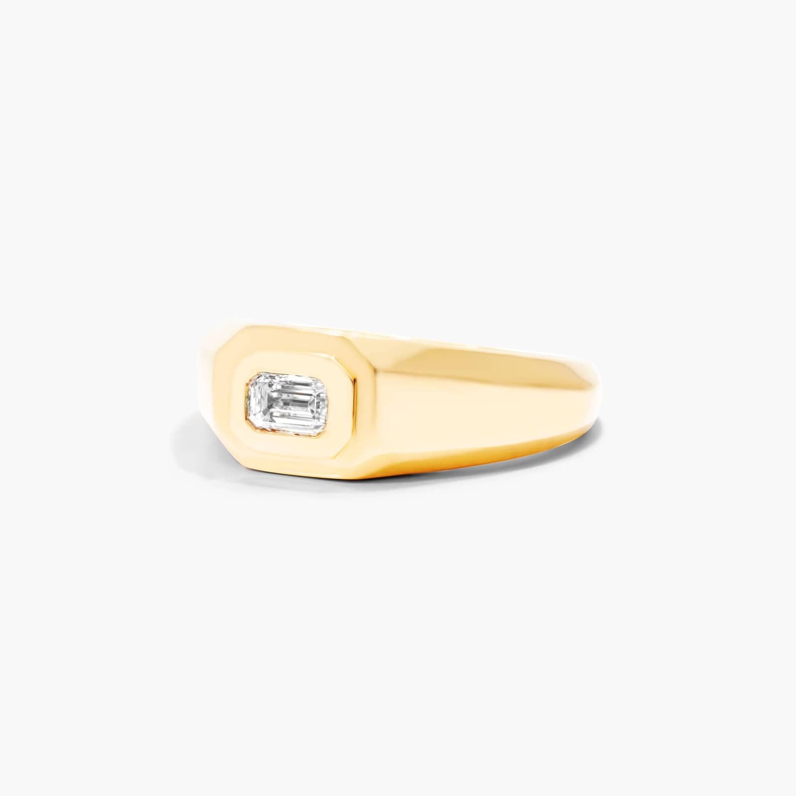 Emerald Cut Solitaire Diamond Ring In 14K Yellow Gold