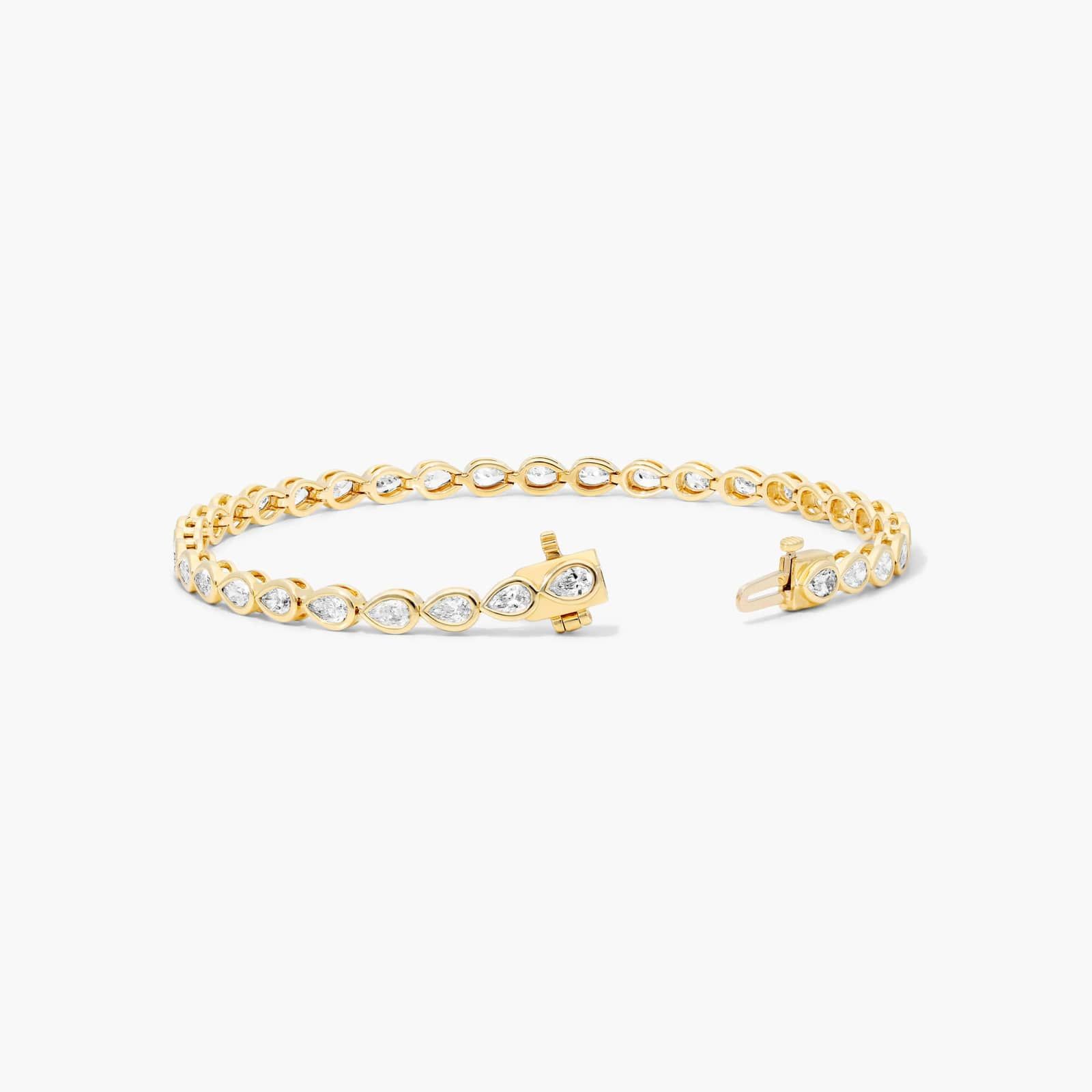 Bezel Tennis Bracelet With Pear Cut Lab-Grown Diamonds In 14K Yellow Gold