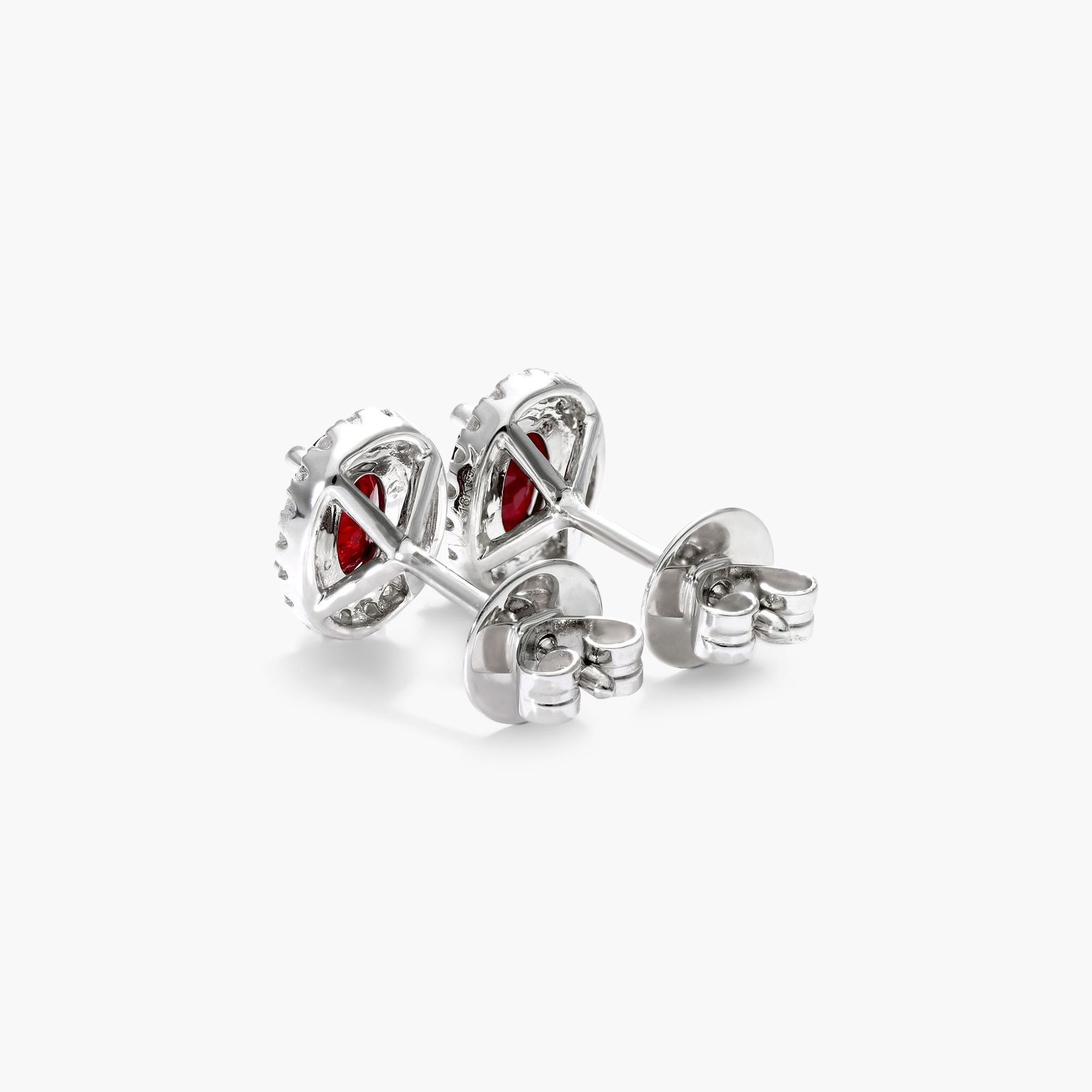 Oval Cut Ruby And Diamond Halo Earrings In 18K White Gold