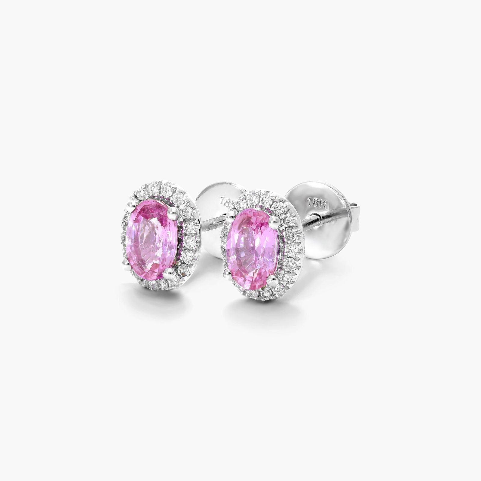 Oval Cut Pink Sapphire And Diamond Halo Earrings In 18K White Gold