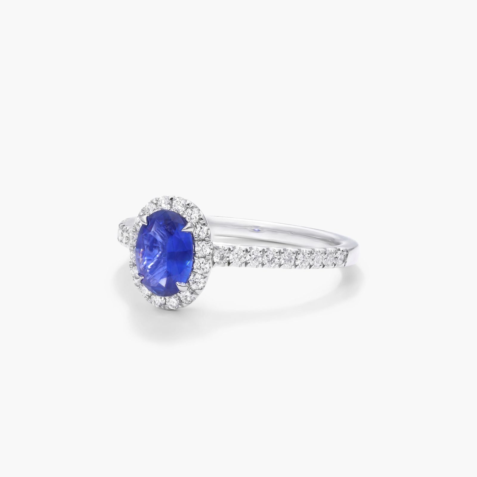 Oval Halo Sapphire And Diamond Ring In 18K White Gold