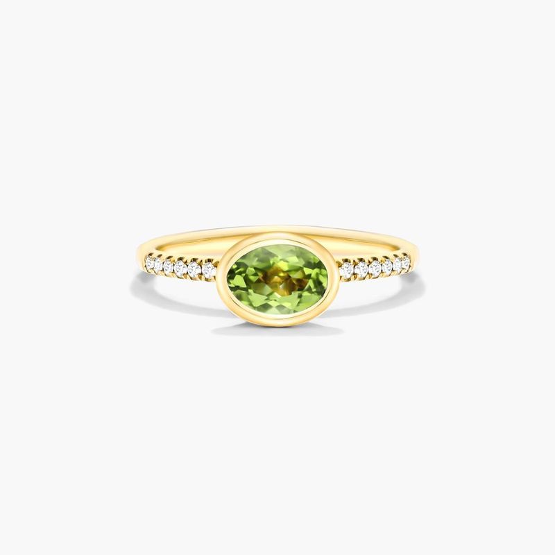 East-West Oval Peridot And Diamond Ring In 18K Yellow Gold