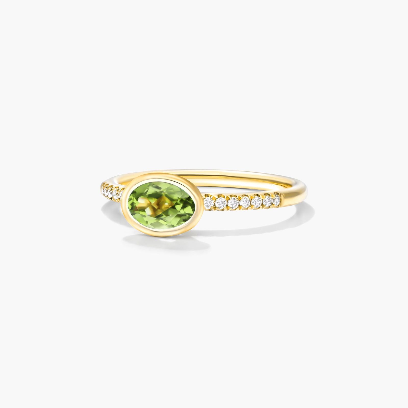 East-West Oval Peridot And Diamond Ring In 18K Yellow Gold