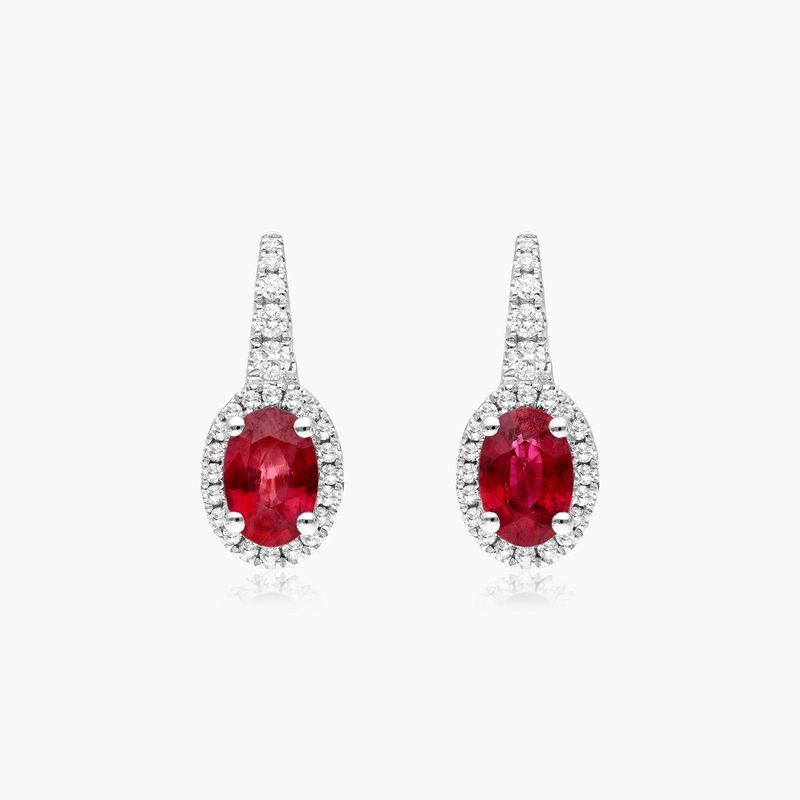 Petite Oval Cut Ruby And Diamond Halo Drop Earrings In 18K White Gold