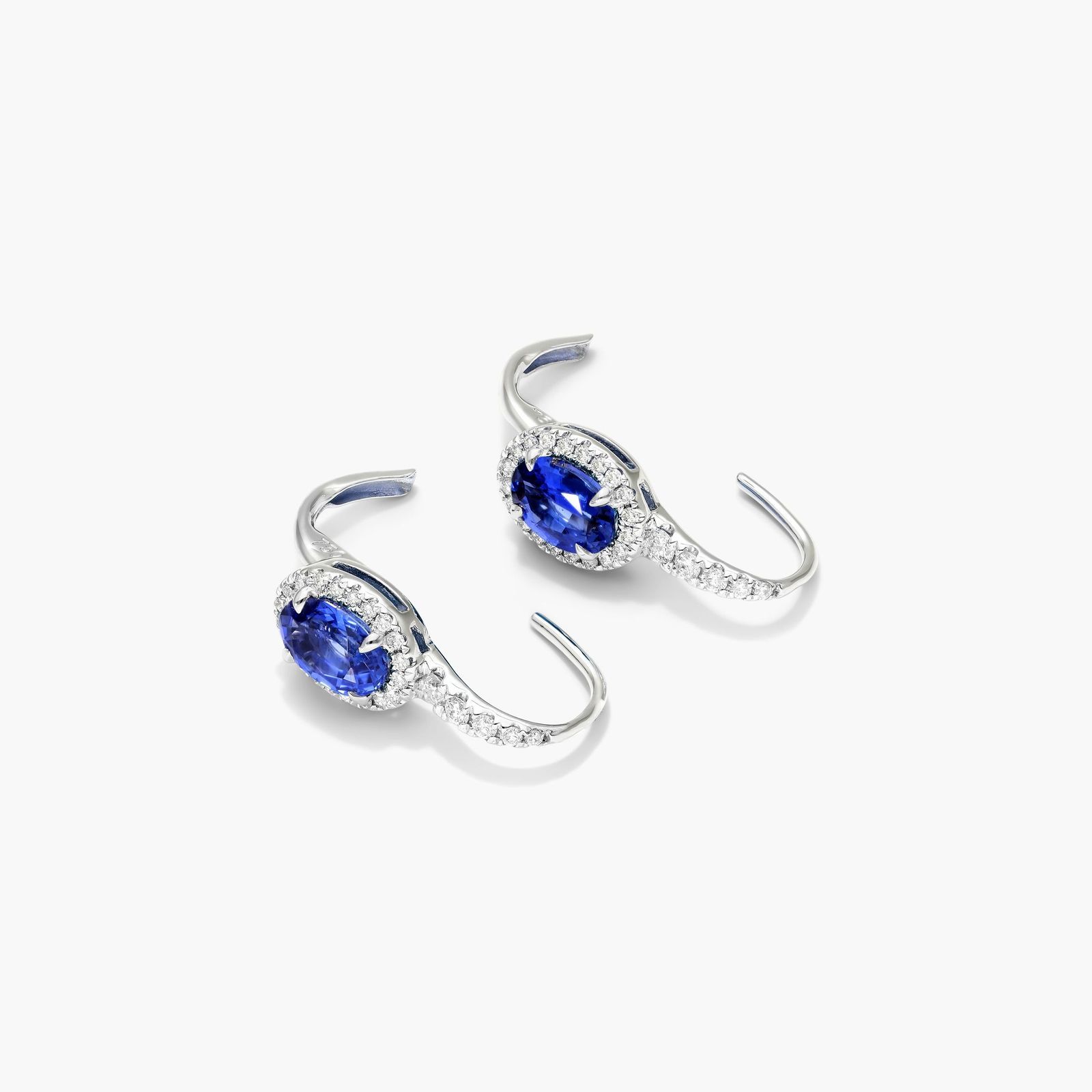 Petite Oval Cut Sapphire And Diamond Halo Drop Earrings In 18K White Gold
