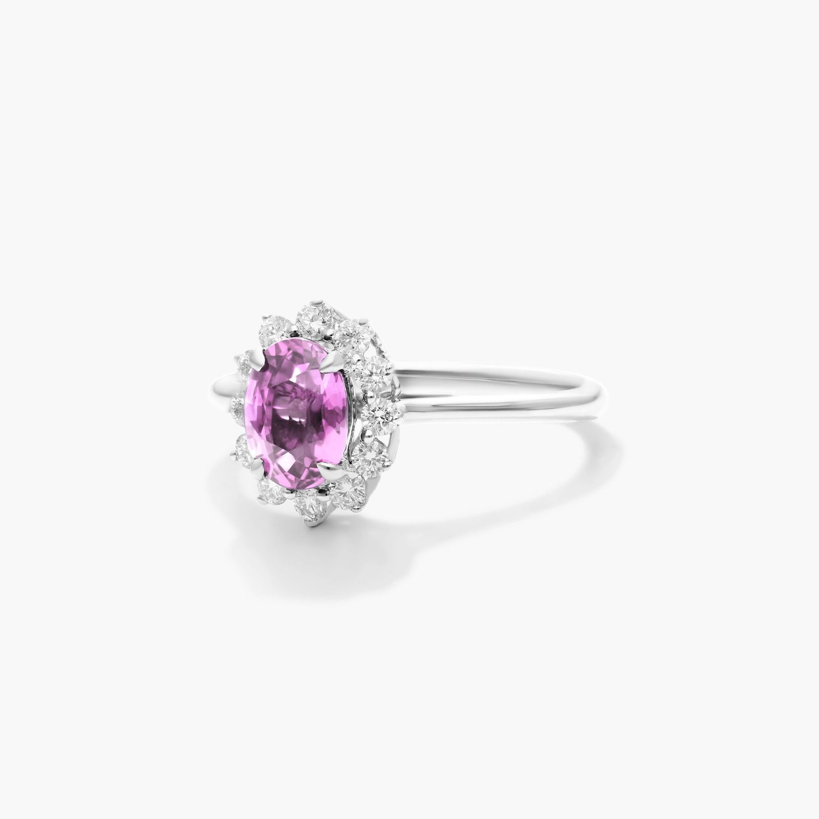 Oval Halo Pink Sapphire And Diamond Ring In 18K White Gold