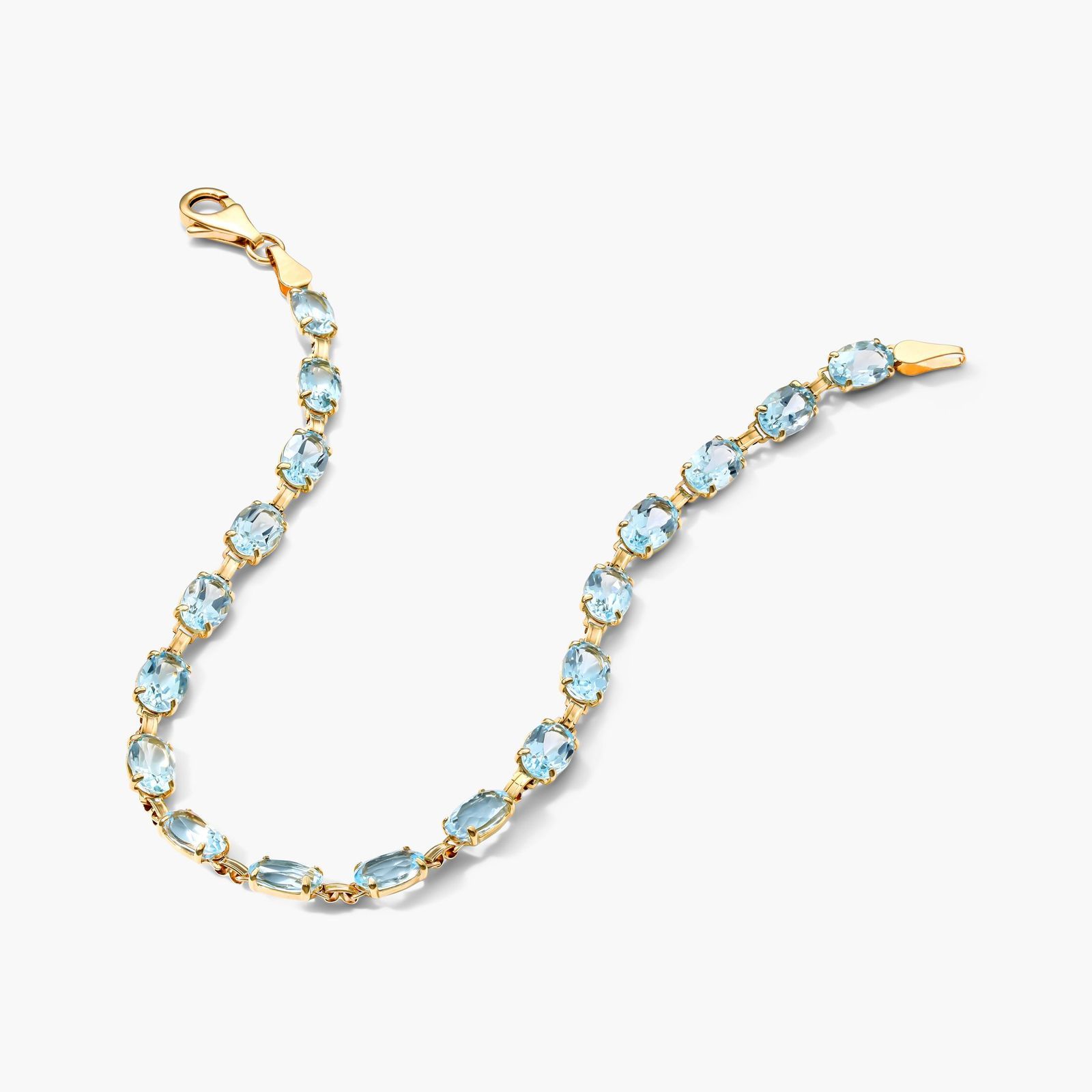 Blue Topaz Line Bracelet In 14K Yellow Gold