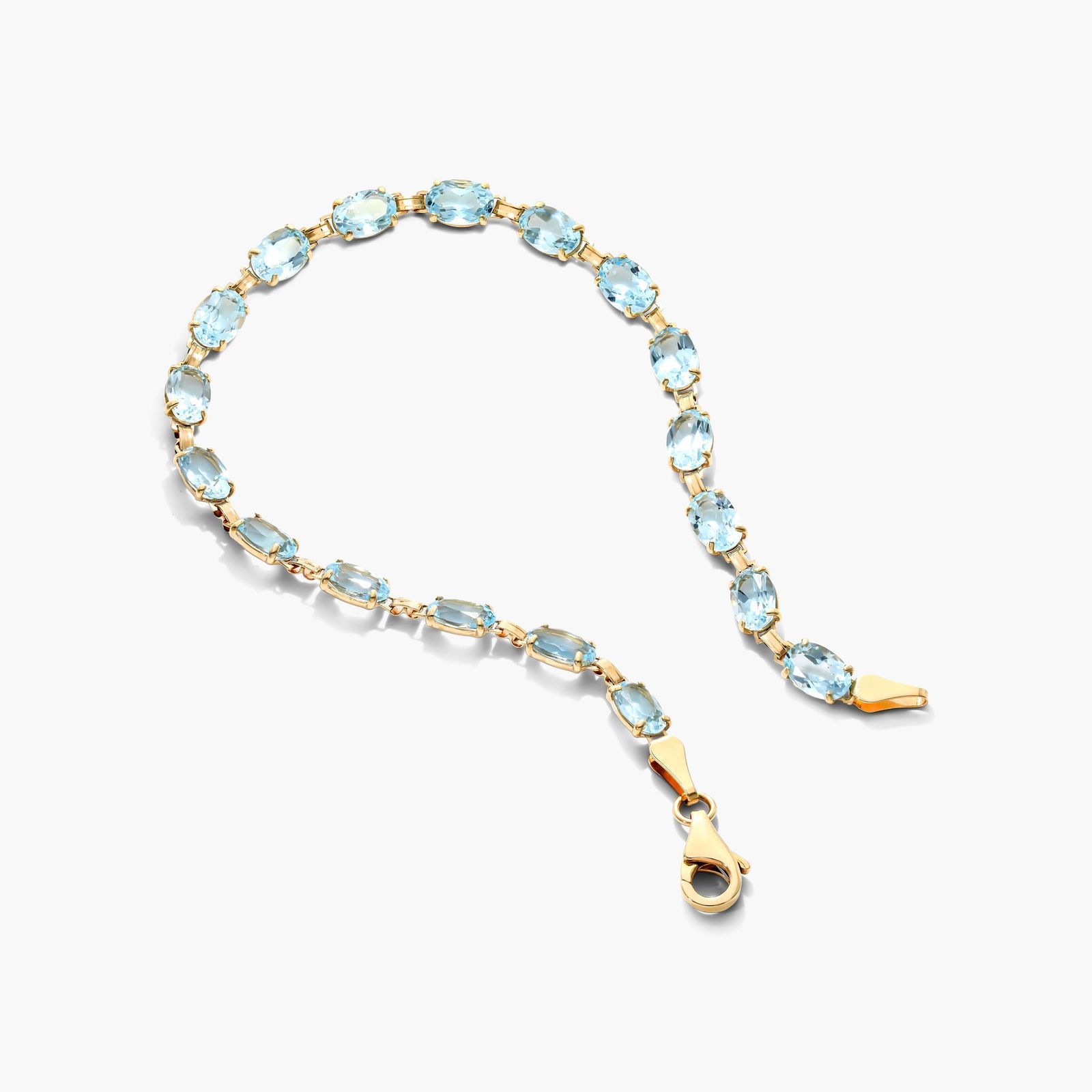 Blue Topaz Line Bracelet In 14K Yellow Gold