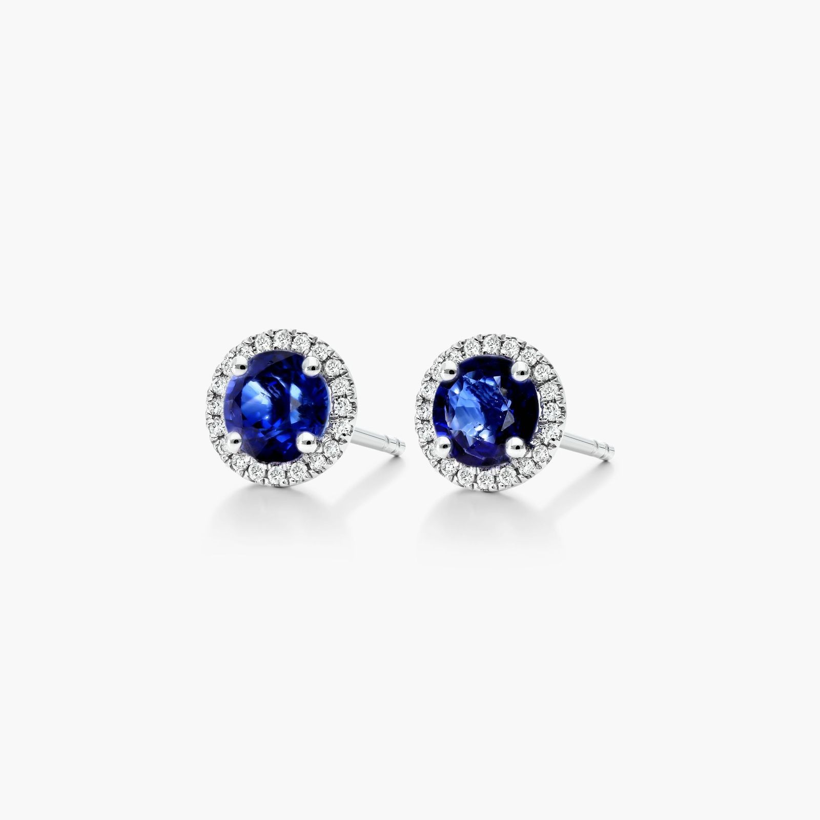 Round Sapphire And Diamond Halo Earrings In 18K White Gold