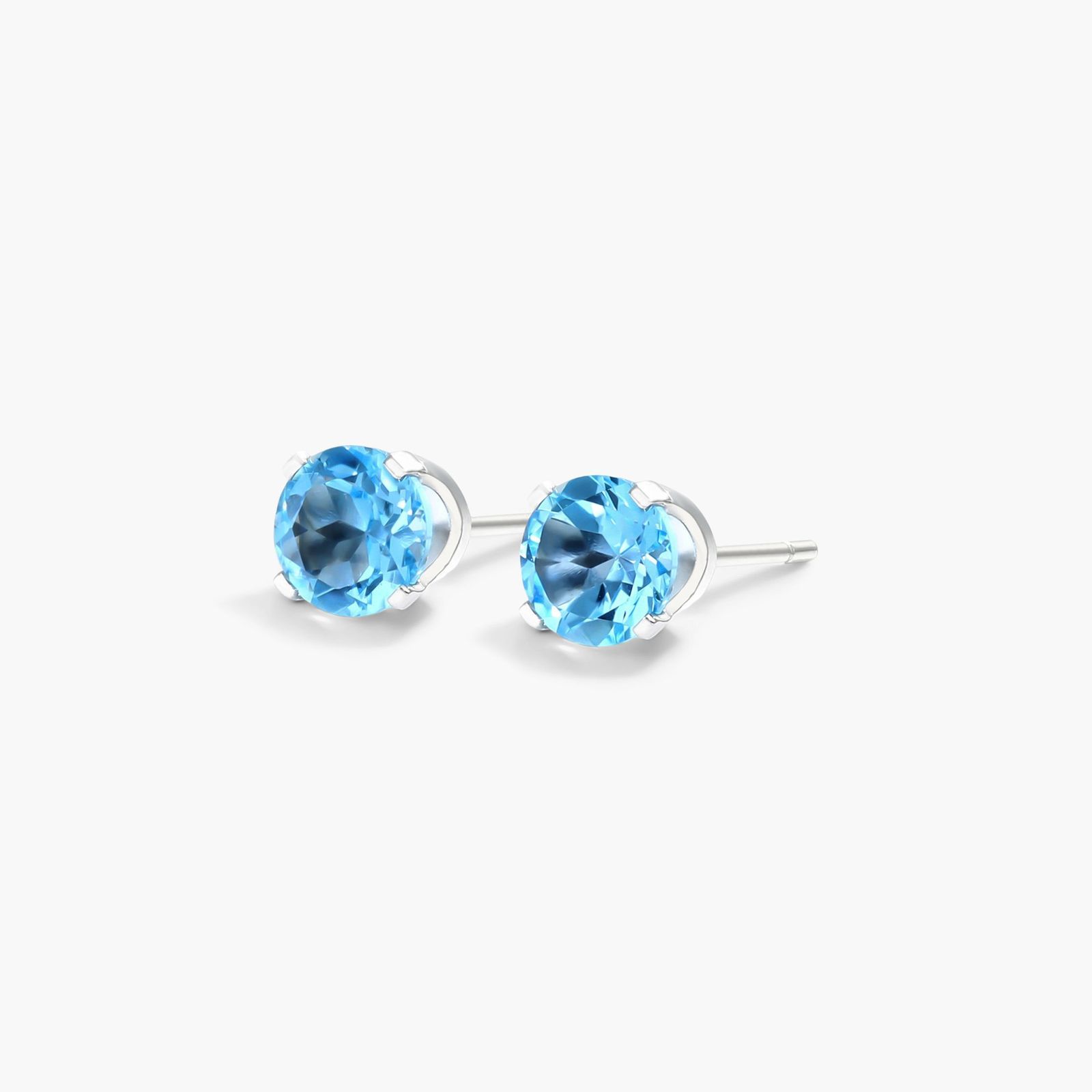 Blue Topaz Birthstone Earrings In 14K White Gold