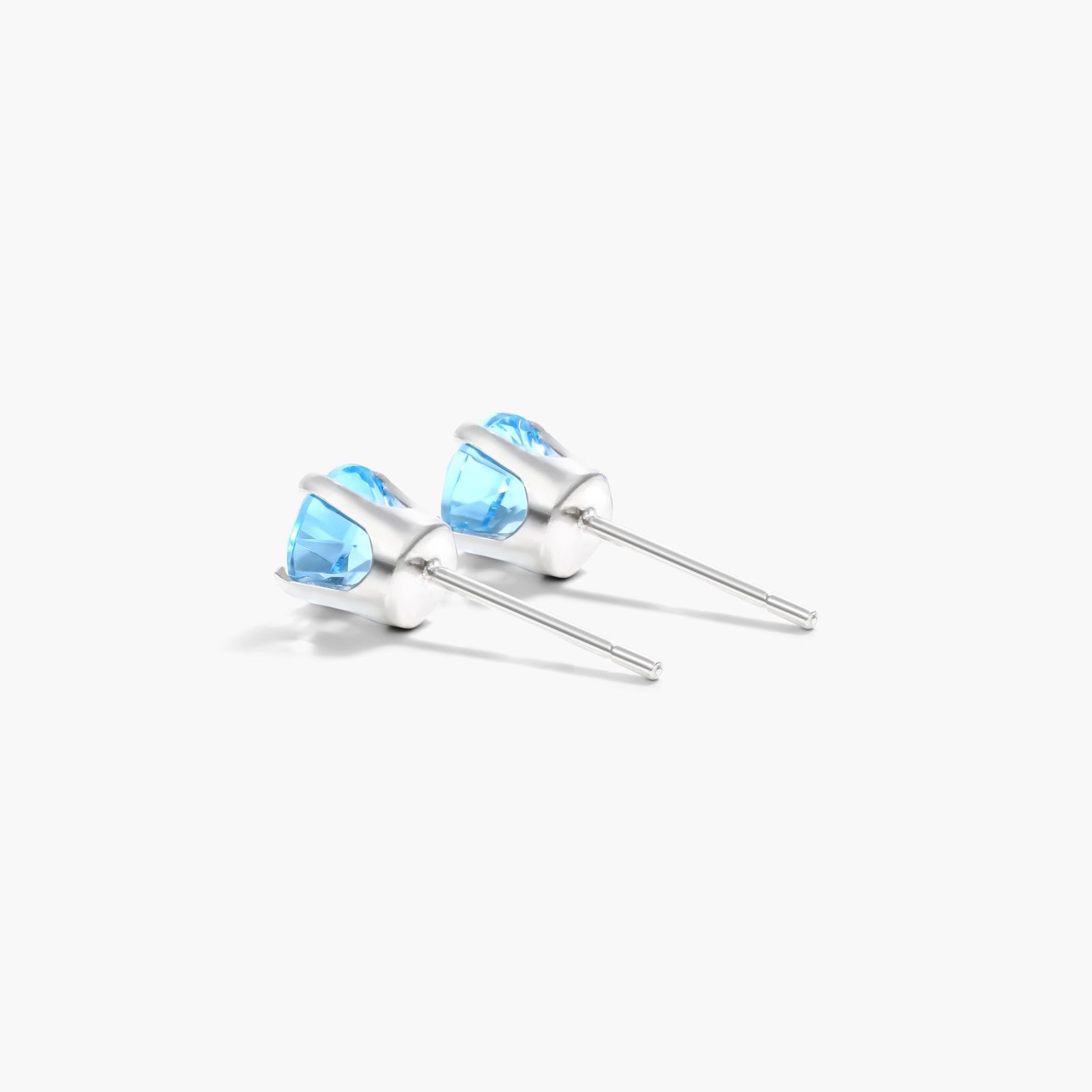 Blue Topaz Birthstone Earrings In 14K White Gold