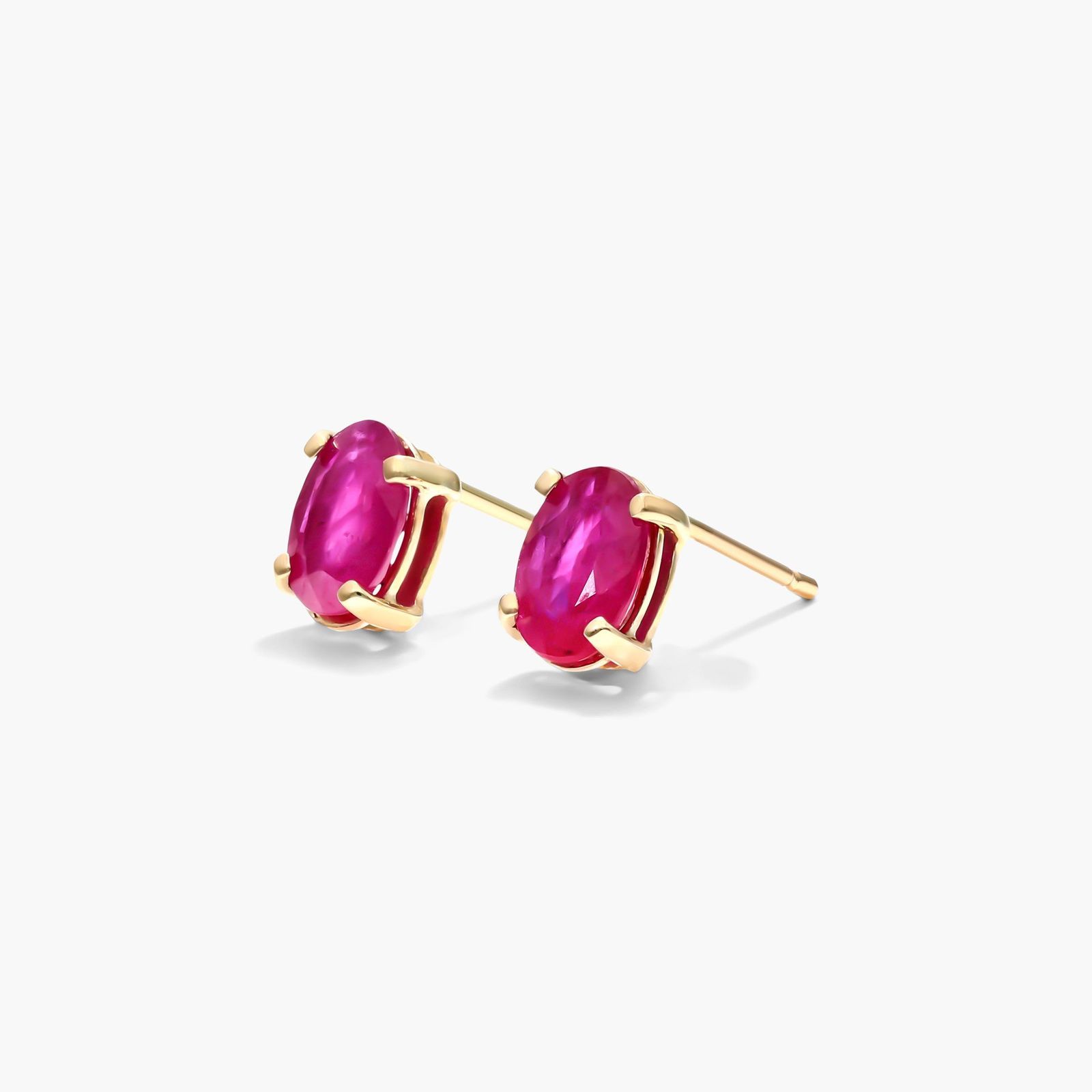 Oval Cut Ruby Birthstone Earrings In 14K Yellow Gold