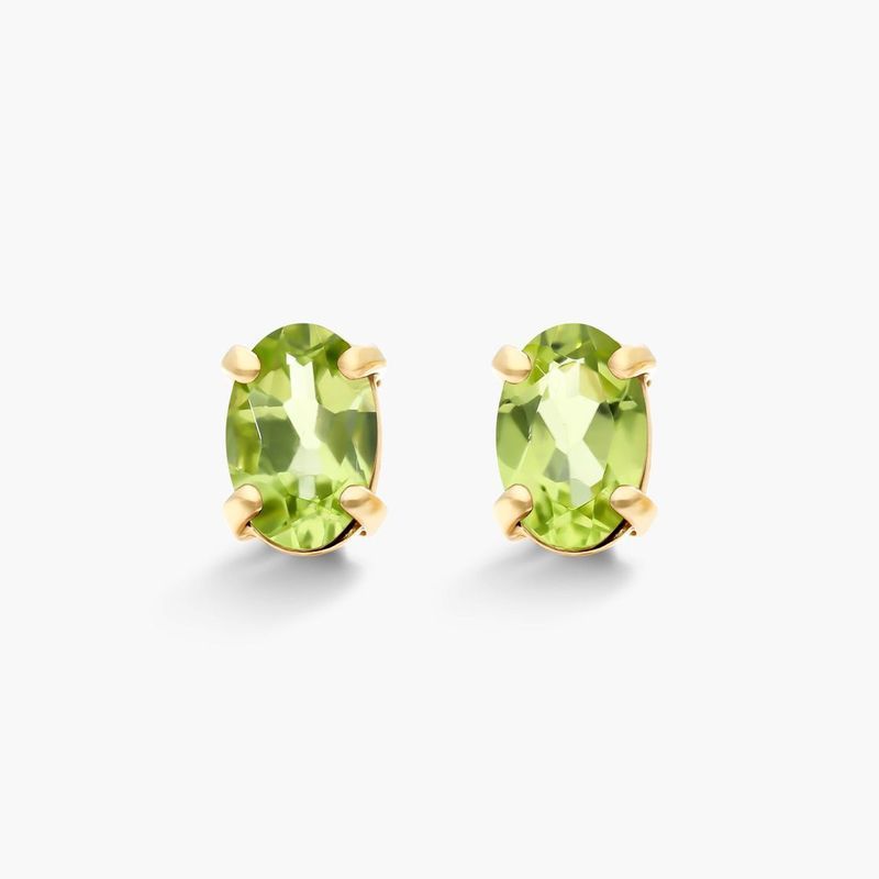 Oval Cut Peridot Birthstone Earrings In 14K Yellow Gold