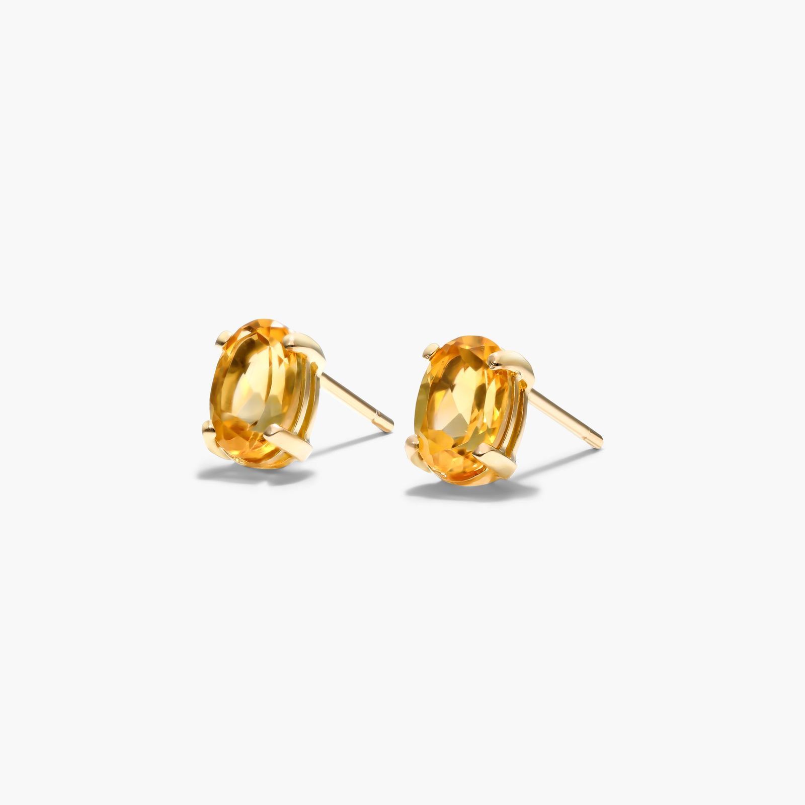 Oval Cut Citrine Birthstone Earrings In 14K Yellow Gold