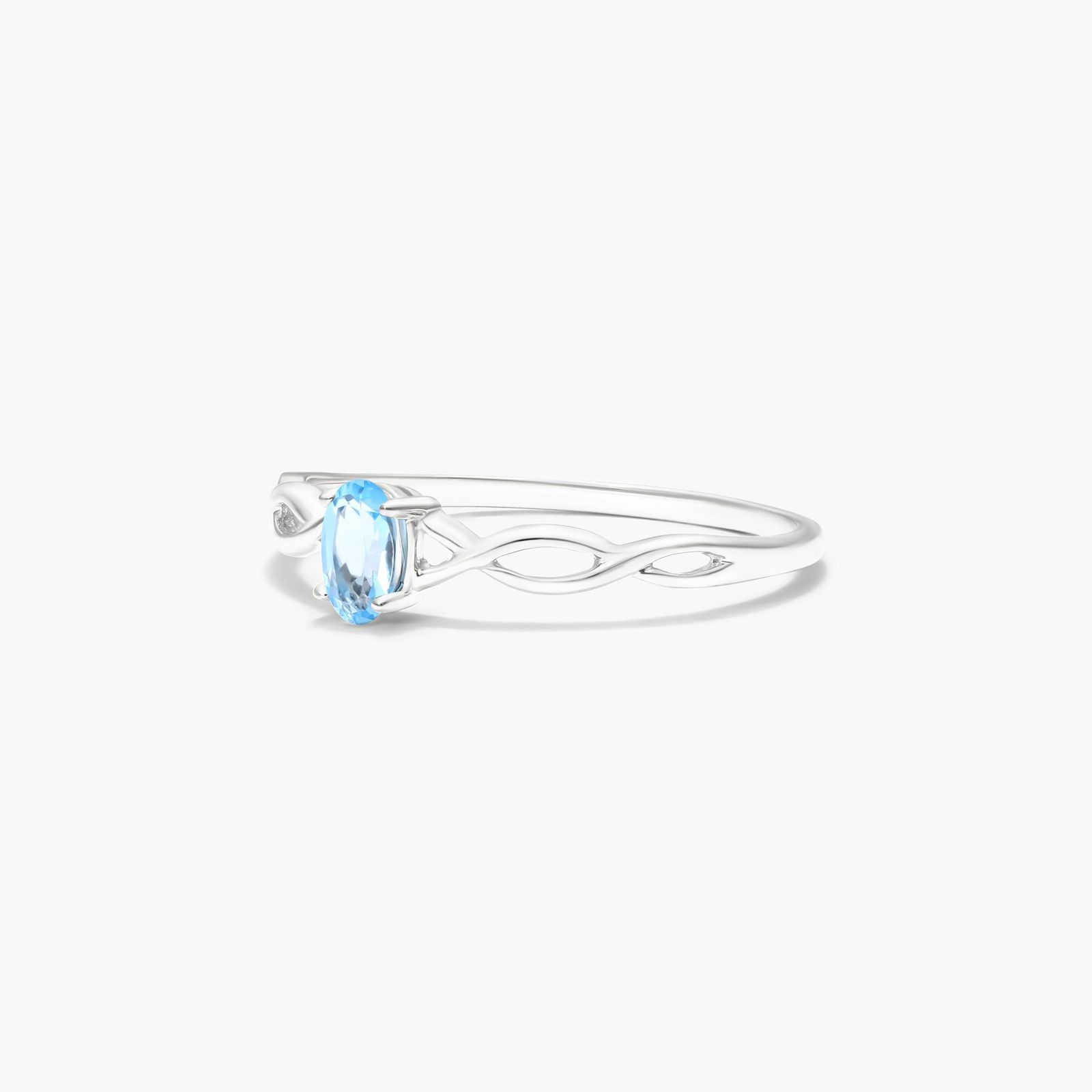 Infinity Blue Topaz Birthstone Ring In 14K White Gold