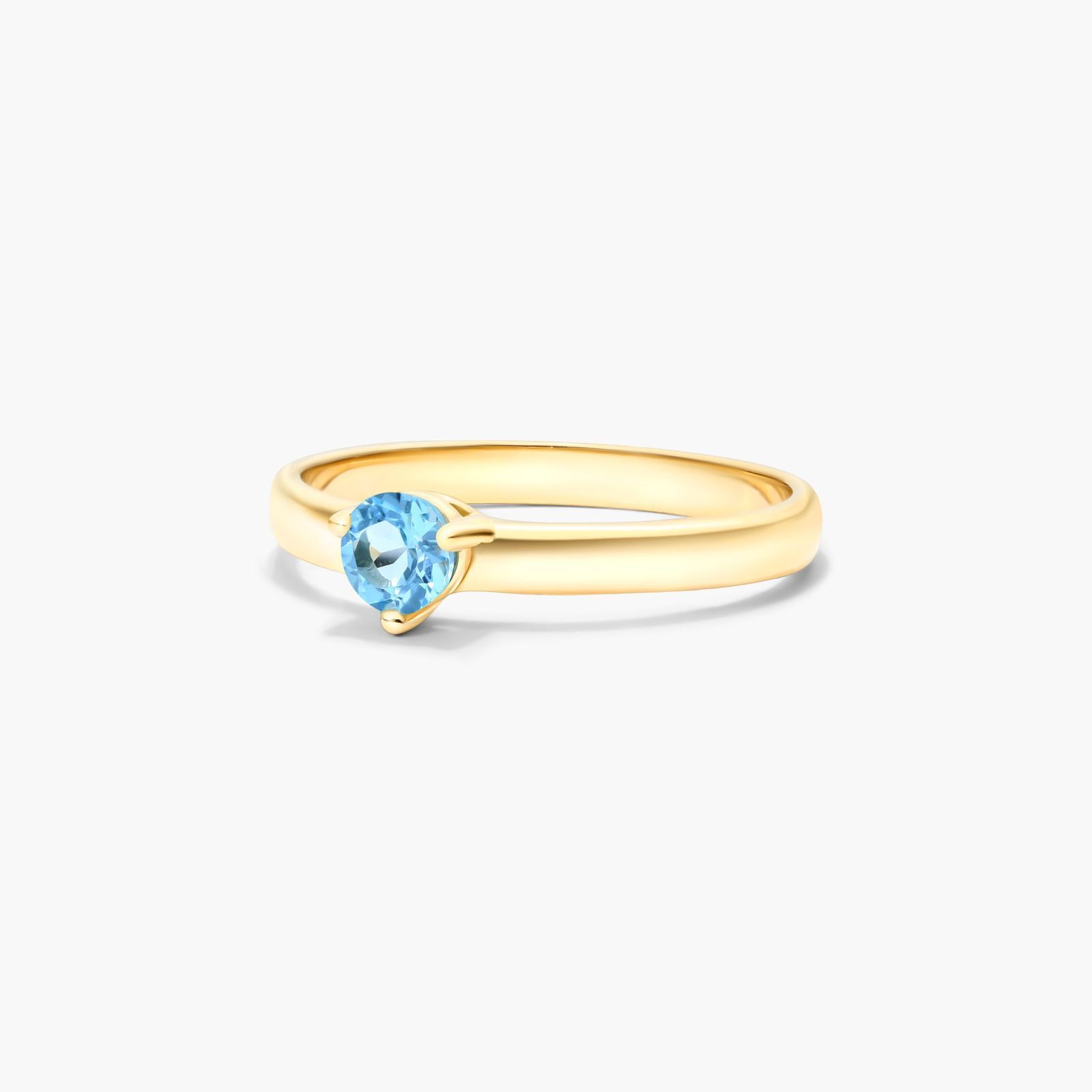 Blue Topaz Solitaire Birthstone Ring In 14K Yellow Gold