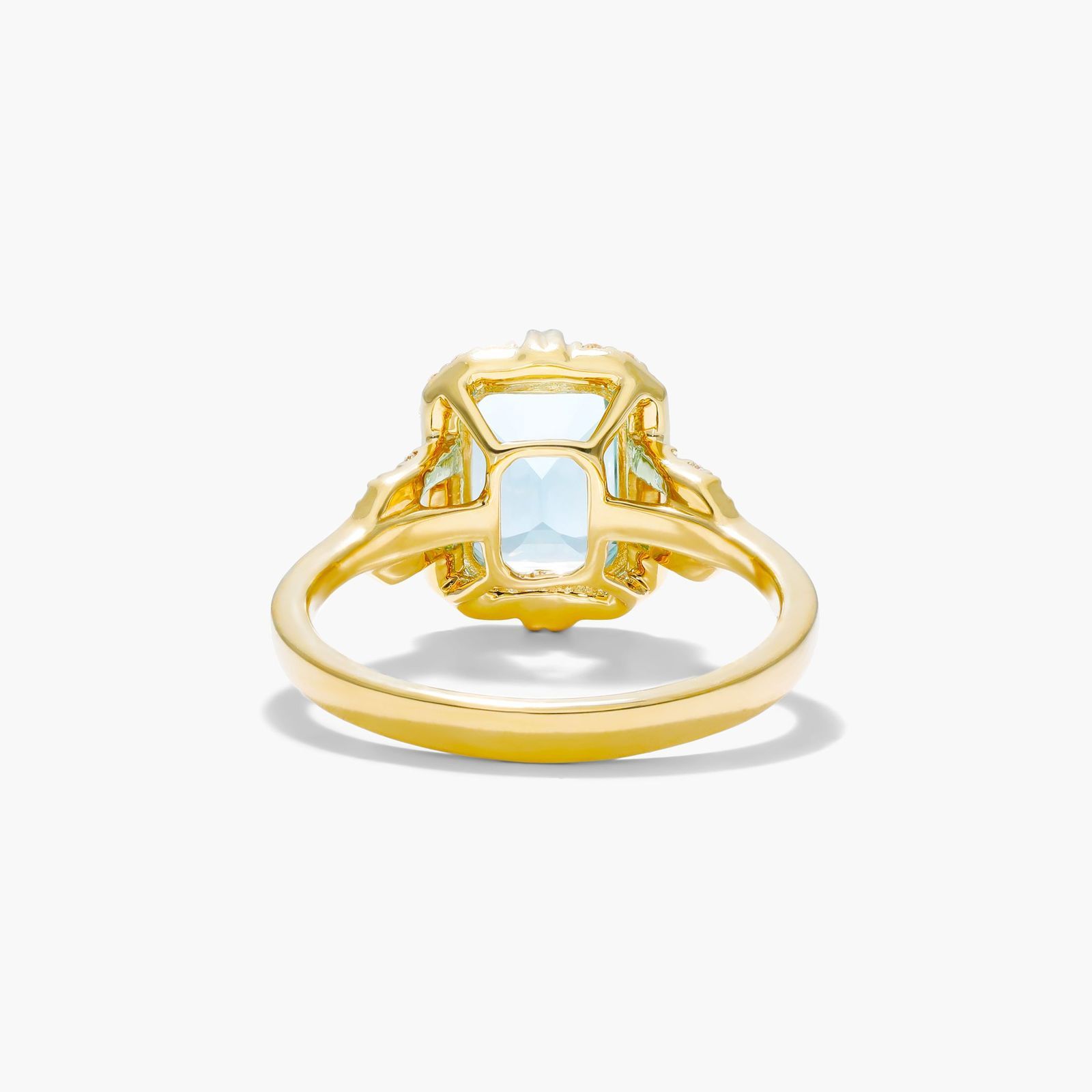 Sky Blue Topaz Diamond Halo Ring In 18K Yellow Gold