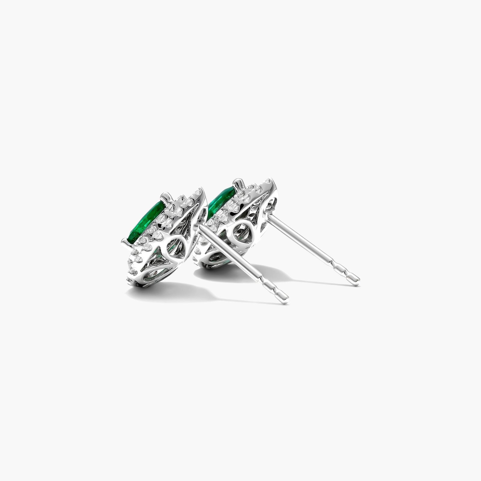 Pear Shape Emerald And Diamond Double Halo Earrings In 18K White Gold