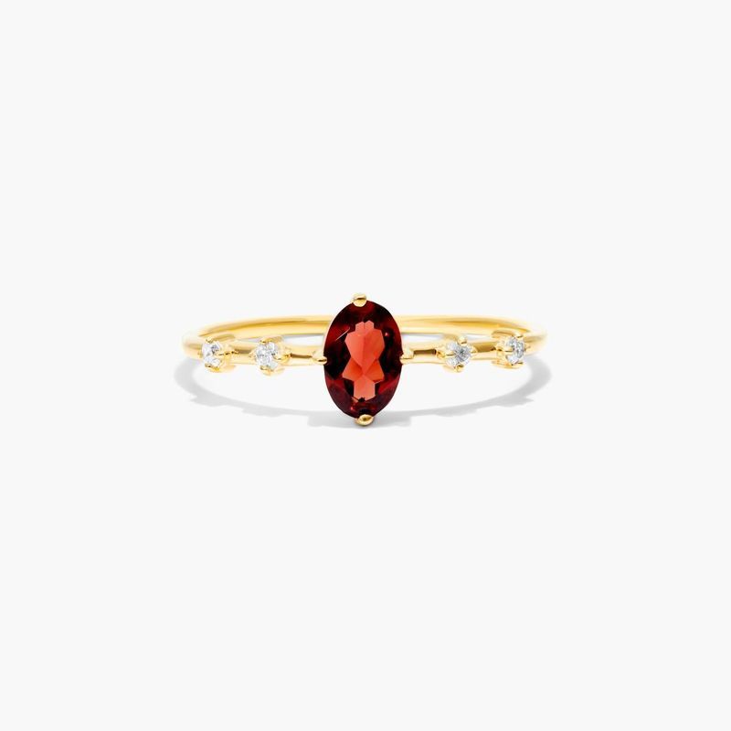 Oval Garnet And Diamond Birthstone Ring In 14K Yellow Gold