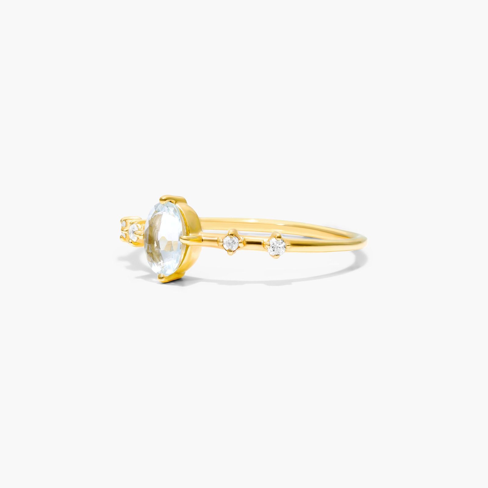 Oval Aquamarine And Diamond Birthstone Ring In 14K Yellow Gold