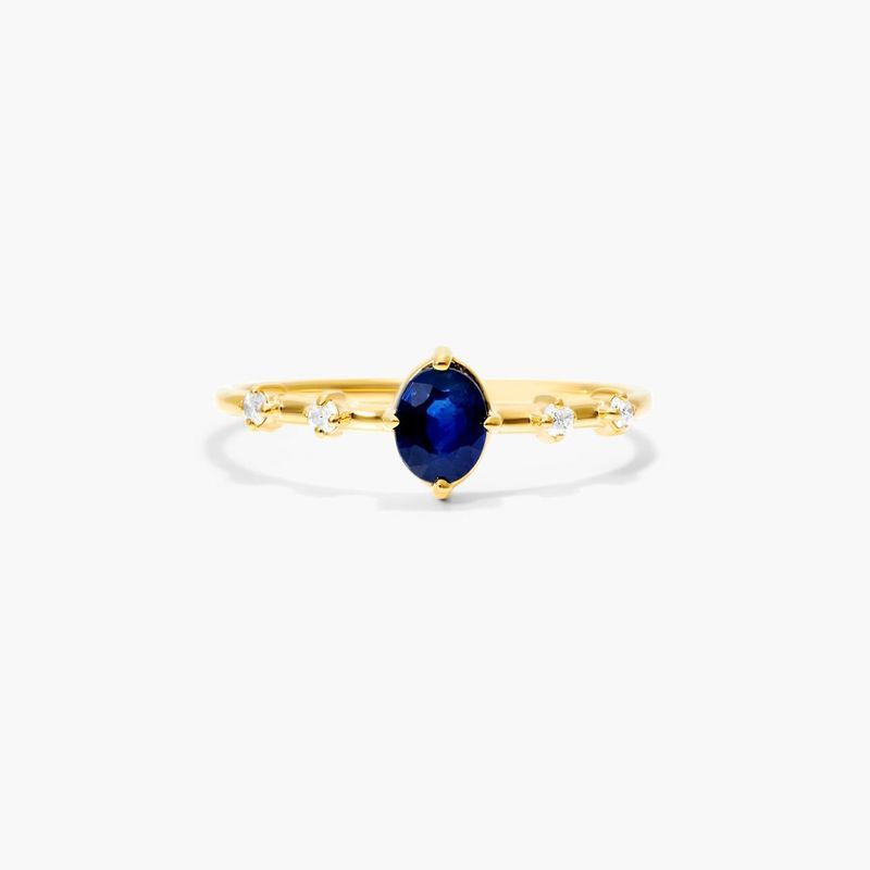 Oval Sapphire And Diamond Birthstone Ring In 14K Yellow Gold