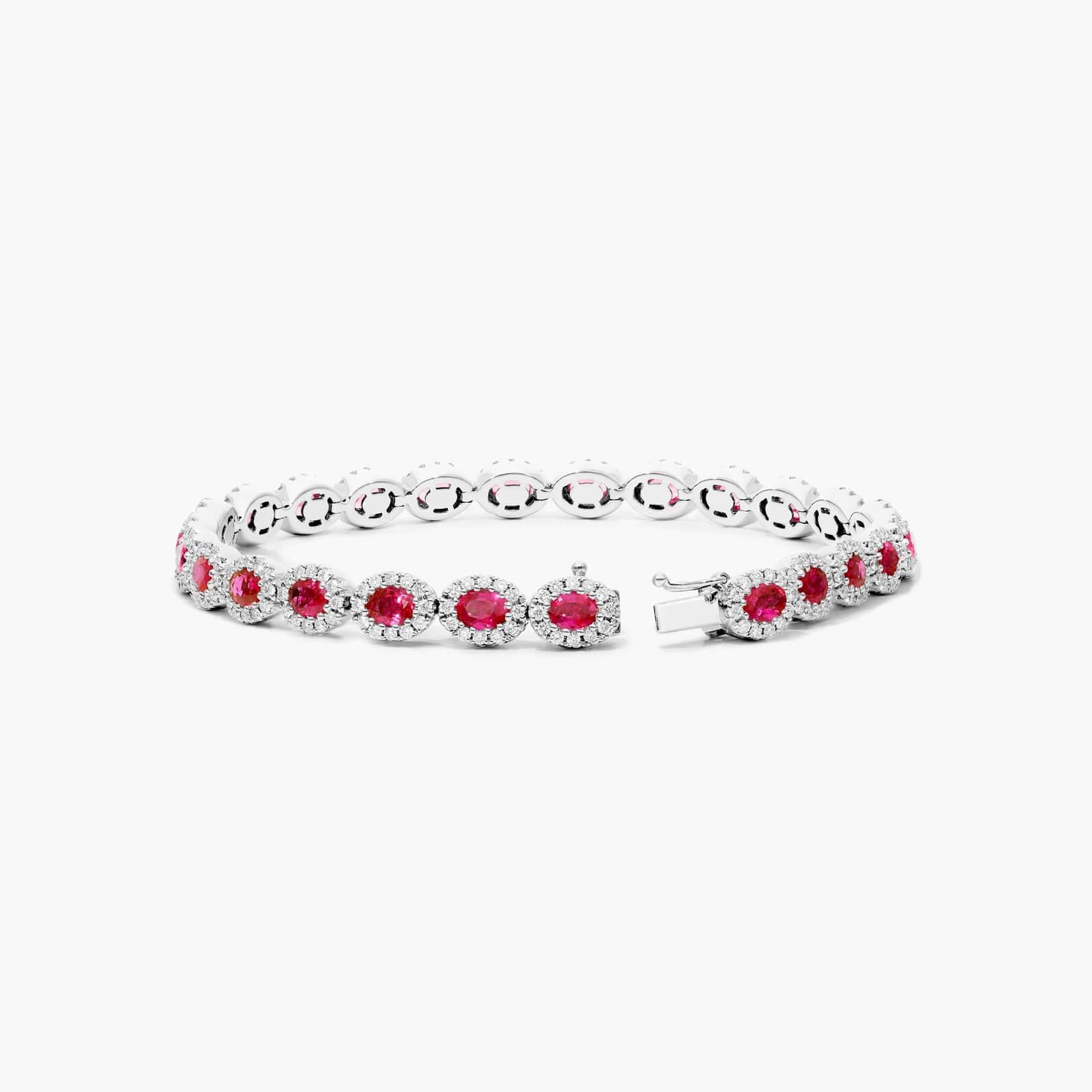 Oval Cut Ruby And Diamond Halo Bracelet In 14K White Gold