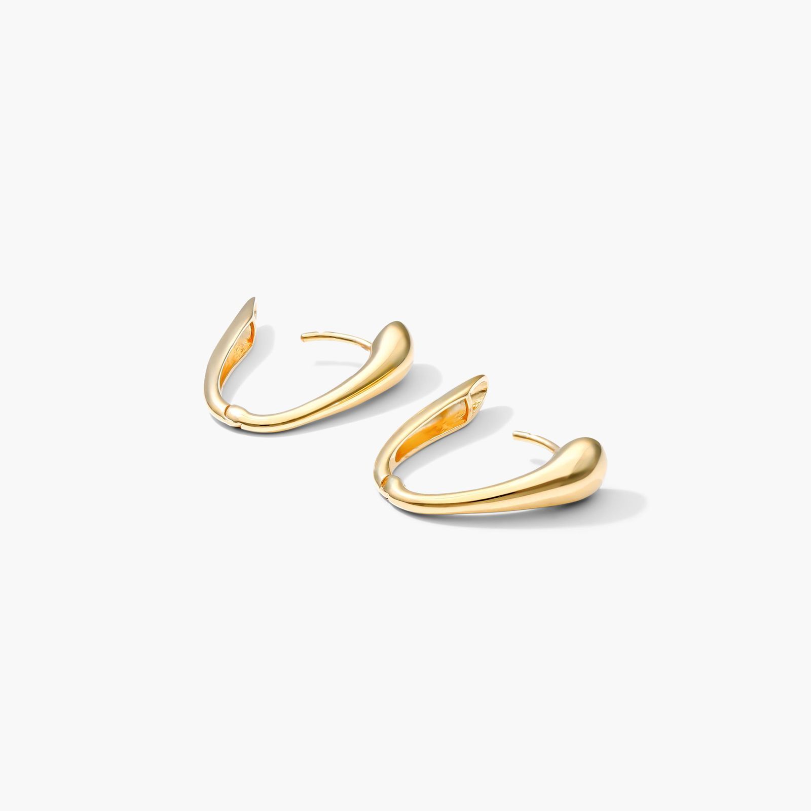 Tapered Oval Huggie Hoop Earrings In 14K Yellow Gold