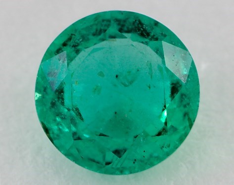 This 1.16 Round Green Emerald is sold exclusively by James Allen 