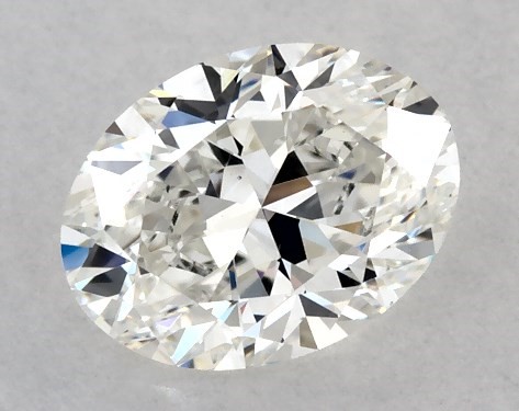 This 0.9 carat oval diamond H color VS1 clarity has Good proportions and a diamond grading report from GIA