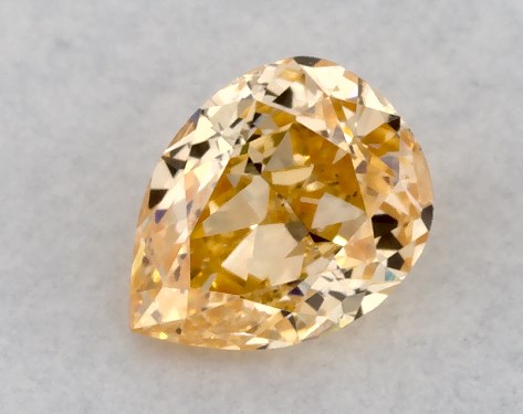 GIA 0.22 Carat Fancy Intense Yellow Orange-SI2 Pear Shaped Diamond