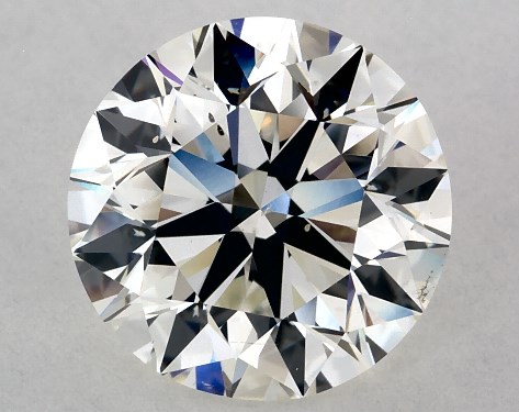 This 3.01 carat round diamond J color SI1 clarity has Excellent proportions and a diamond grading report from GIA