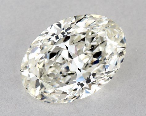 This 0.96 carat oval diamond J color VVS1 clarity has Ideal proportions and a diamond grading report from GIA
