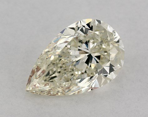 This 1 carat pear diamond K color SI1 clarity has Very Good proportions and a diamond grading report from IGI